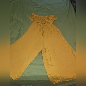 Golden colored strapless wide leg jump suit